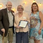 Randy and Judy Mills receiving an award